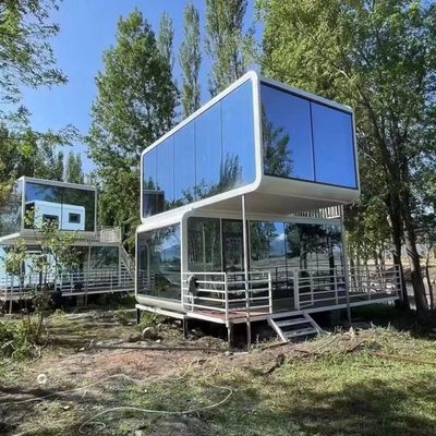 Direct leveren Buitenruimte Capsule Huis Verhuisbaar Huis Capsule Huis Elektriciteit Stopcontacten Staal Commerciële Ruimte